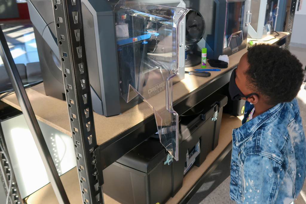 Image of student with 3D Printer